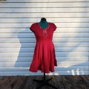Red skater dress, sequins and embroidery, pockets!